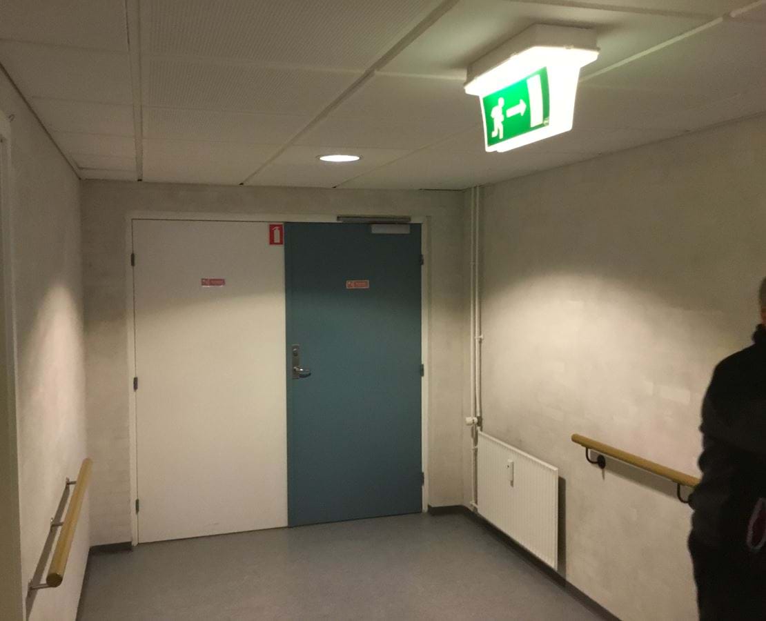 Grønt flugtvejsskilt